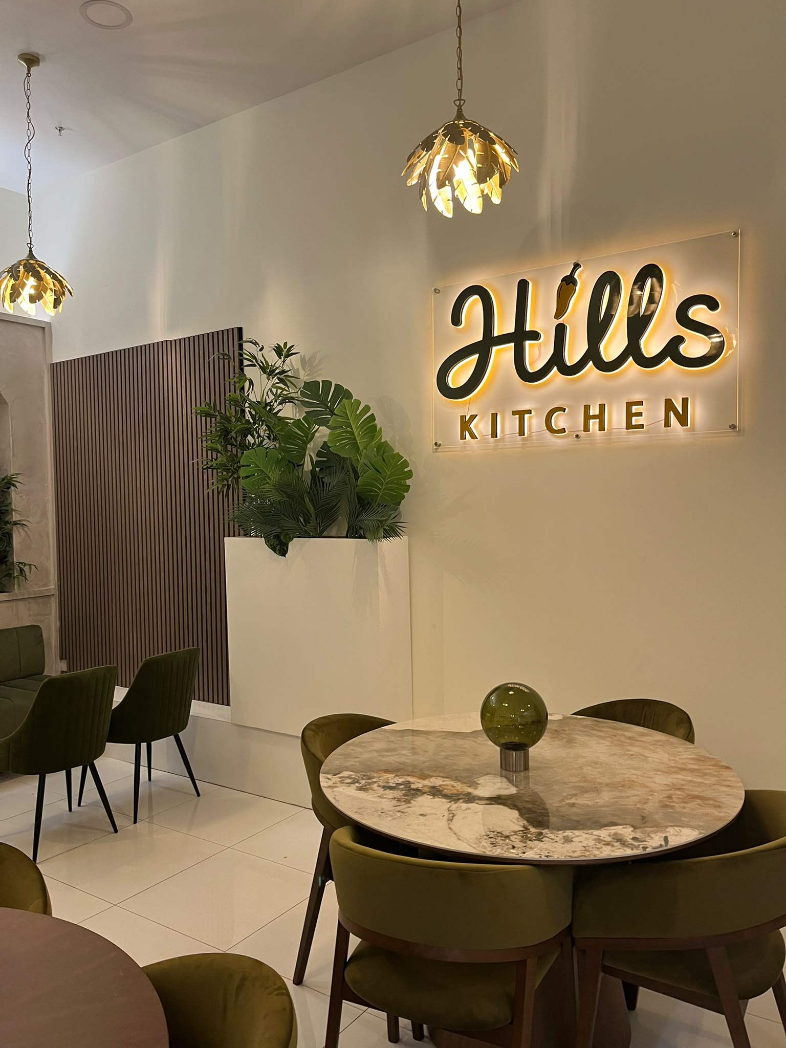 Hills Kitchen illuminated logo wall